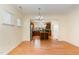 Dining area with hardwood floors, a chandelier, and easy access to the kitchen at 1522 Palmer Hill Dr, Durham, NC 27703