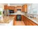 Well-equipped kitchen featuring stainless steel appliances, ample cabinet space, and stylish countertops at 1522 Palmer Hill Dr, Durham, NC 27703