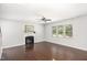 Spacious living room featuring hardwood floors, fireplace and large windows at 163 Davelyn Ct, Garner, NC 27529