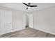 Bedroom featuring light gray walls, vinyl floors, and a closet at 1647 Turner Rd, Mebane, NC 27302