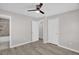 Bedroom with gray walls, vinyl floors and a doorway to the bathroom at 1647 Turner Rd, Mebane, NC 27302