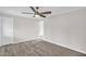 Bright bedroom featuring a modern ceiling fan and vinyl flooring at 1647 Turner Rd, Mebane, NC 27302