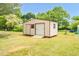 Exterior shot of a storage shed with double door and ramp at 1647 Turner Rd, Mebane, NC 27302