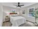 Bright bedroom with natural light, ceiling fan, and stylish furnishings at 1732 Green Pace Rd, Zebulon, NC 27597
