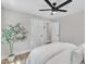 Cozy bedroom with a ceiling fan and ensuite bathroom entrance at 1732 Green Pace Rd, Zebulon, NC 27597