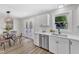 Bright kitchen with eat-in area, stainless appliances, and white countertops at 1732 Green Pace Rd, Zebulon, NC 27597