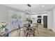 Eat-in kitchen area with updated stainless appliances and a view of the backyard at 1732 Green Pace Rd, Zebulon, NC 27597