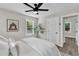 Main bedroom featuring a ceiling fan, neutral walls and light hardwood floors at 1732 Green Pace Rd, Zebulon, NC 27597