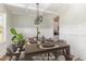 Elegant dining room featuring a modern chandelier and stylish decor at 175 Trescott St, Smithfield, NC 27577