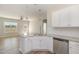 A kitchen island has granite counters, stainless appliances, and plenty of cabinet space at 175 Trescott St, Smithfield, NC 27577