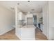 A kitchen features granite counters, an island with pendant lighting, and stainless appliances at 175 Trescott St, Smithfield, NC 27577