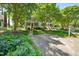 Charming two-story home with beautifully landscaped yard and a classic white picket fence at 1806 Carrington Dr, Raleigh, NC 27615