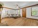 Bright living room boasts a cozy fireplace, wood floors, and stylish furniture for a relaxing atmosphere at 1806 Carrington Dr, Raleigh, NC 27615