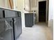 Bathroom featuring gray cabinets and decorative hardware at 196 Cozy Brook Ct, Clayton, NC 27520