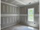 Bedroom featuring drywall, window and natural light at 196 Cozy Brook Ct, Clayton, NC 27520