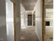 View of the hallway featuring an entryway to other parts of the house at 196 Cozy Brook Ct, Clayton, NC 27520