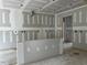 Spacious kitchen featuring an island, recessed lighting and unfinished walls at 196 Cozy Brook Ct, Clayton, NC 27520