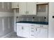 New kitchen featuring white cabinets and drawers, with countertop covered in protective plastic at 196 Cozy Brook Ct, Clayton, NC 27520