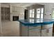 Open-concept living space under construction, featuring a fireplace and built-in shelving at 196 Cozy Brook Ct, Clayton, NC 27520