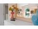 Brightly decorated bedroom features cheerful sunflowers, a gold mirror, and fresh natural light at 196 Ethel Ln, Angier, NC 27501