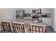 Open concept kitchen with granite island, stainless steel appliances, and ample counter space for cooking at 196 Ethel Ln, Angier, NC 27501