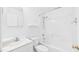Bright, all-white bathroom featuring a tub-shower, sink, and toilet at 196 Tara Ln, Timberlake, NC 27583