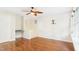 Bedroom featuring wood-look floors, ceiling fan and a desk at 196 Tara Ln, Timberlake, NC 27583