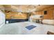 Spacious garage with ample lighting, storage, and a work area, ready for projects and organization at 196 Tara Ln, Timberlake, NC 27583
