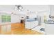 Bright kitchen featuring white cabinetry and stainless steel appliances at 196 Tara Ln, Timberlake, NC 27583