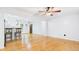 Bright open living space with hardwood floors and eat-in kitchen bar seating at 196 Tara Ln, Timberlake, NC 27583