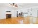 Open-concept living area with fireplace and eat-in kitchen bar seating at 196 Tara Ln, Timberlake, NC 27583