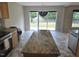 Kitchen featuring stainless steel appliances and granite countertop island at 2018 Groundwater Pl, Raleigh, NC 27610
