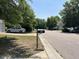 Street view featuring landscaped front yards and parked cars along the curb at 2018 Groundwater Pl, Raleigh, NC 27610