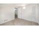 Neutral bedroom featuring a door to an ensuite space and a large closet at 2027 Jefferson Dr, Hillsborough, NC 27278