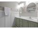 A light and bright bathroom featuring double sinks and a towel rack at 204 Rossburn Way, Chapel Hill, NC 27516