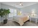 Charming bedroom with neutral paint, ceiling fan, and natural light at 204 Rossburn Way, Chapel Hill, NC 27516