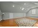 Bright bonus room with hardwood floors, recessed lighting, and a ceiling fan at 204 Rossburn Way, Chapel Hill, NC 27516