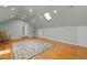 Spacious bonus room featuring hardwood floors, recessed lighting, and a ceiling fan at 204 Rossburn Way, Chapel Hill, NC 27516