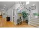Welcoming foyer featuring hardwood floors, staircase, and access to multiple rooms at 204 Rossburn Way, Chapel Hill, NC 27516