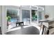 Indoor bar area with direct access to outdoor lounge and pool area at 204 Rossburn Way, Chapel Hill, NC 27516
