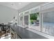 Indoor bar featuring seating, outdoor access, and a view of the pool at 204 Rossburn Way, Chapel Hill, NC 27516