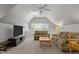 Cozy living room with large TV, sofas and a window at 204 Rossburn Way, Chapel Hill, NC 27516
