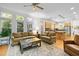 Inviting living room with hardwood floors, neutral walls, and a seamless transition to the kitchen area at 204 Rossburn Way, Chapel Hill, NC 27516