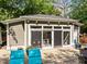 Outdoor living area featuring an outdoor kitchen, seating and grill at 204 Rossburn Way, Chapel Hill, NC 27516