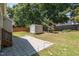 A backyard featuring a storage shed and a playset at 209 Mccarthy Dr, Clayton, NC 27527