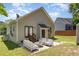 Charming backyard featuring an outdoor seating area perfect for relaxing or entertaining at 209 Mccarthy Dr, Clayton, NC 27527