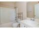Functional bathroom featuring a tub-shower combination, a white vanity with sink, and a mirror at 209 Mccarthy Dr, Clayton, NC 27527