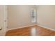 This bedroom is bright and has hardwood floors at 209 Mccarthy Dr, Clayton, NC 27527