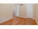 Bedroom with hardwood floors and white doors at 209 Mccarthy Dr, Clayton, NC 27527