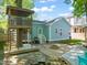Charming backyard with a treehouse, patio, fire pit, and well-maintained lawn; perfect for outdoor enjoyment at 2210 Bedford Ave, Raleigh, NC 27607